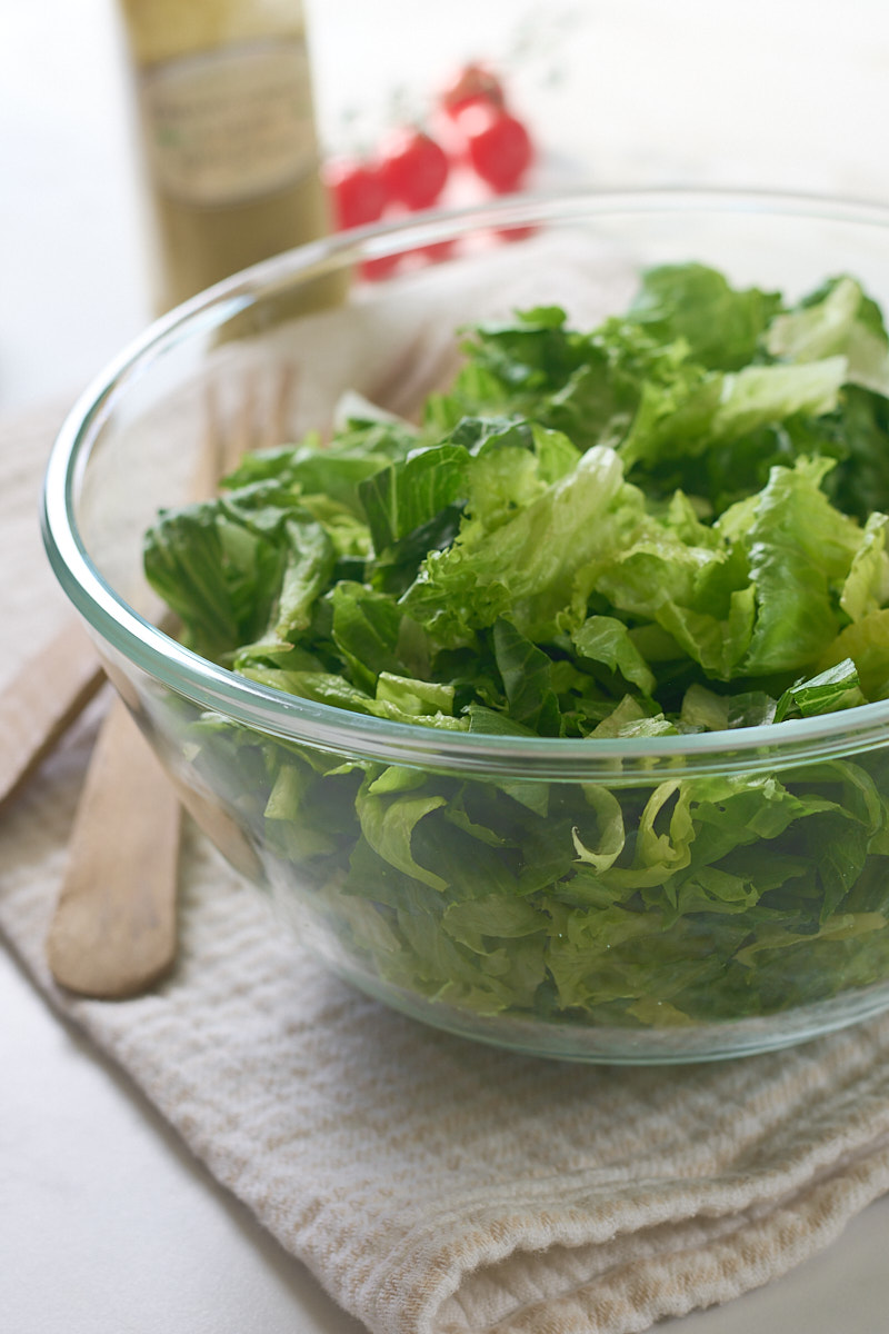 salad in bowl, with salad forks