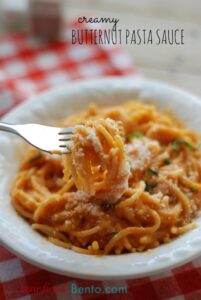 this is a picture of creamy butternut pasta sauce that contains butternut squash, red bell pepper, and garlic. Recipe at beneficial-bento.com