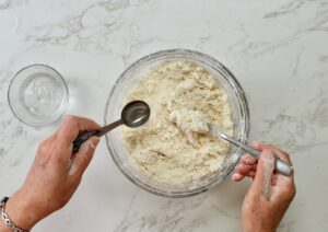 step 5. add water until dough forms a ball