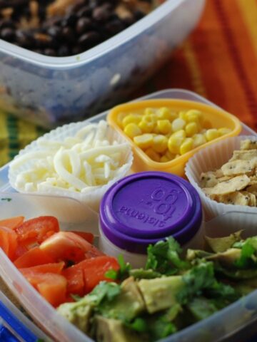 Healthy, colorful meal in a compact little container - perfect to take to work!