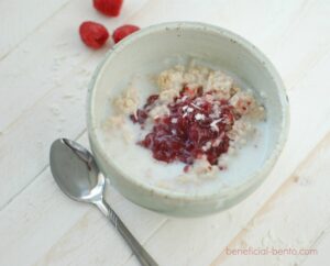 this is a picture of Raspberry Coconut Oatmeal. Recipe at beneficial-bento.com