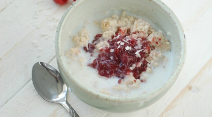 this is a picture of Raspberry Coconut Oatmeal. Recipe at beneficial-bento.com