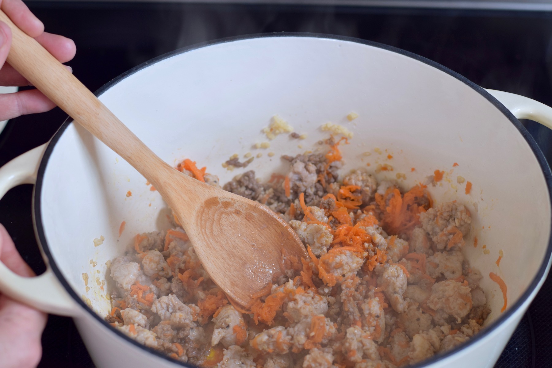 step 1. brown meat, garlic, carrots