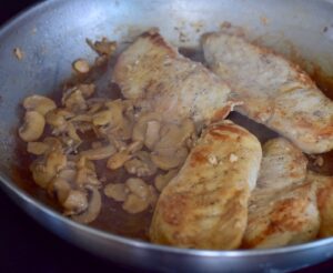 step 4. add mushrooms to pan