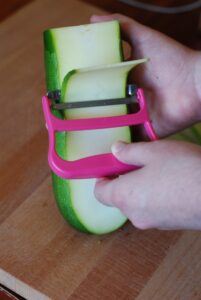 a wide peeler is the best tool to make zucchini lasagna