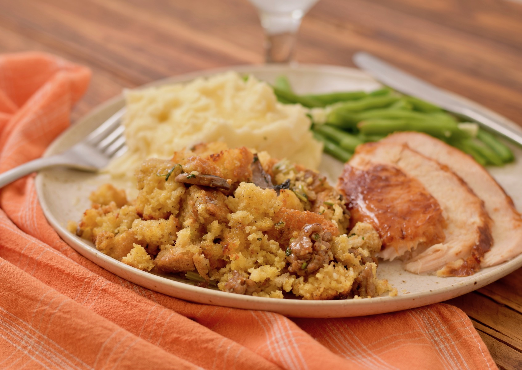 gluten free cornbread and sausage stuffing on dinner plate