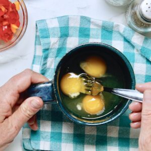 step 1. crack eggs into mug