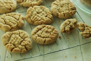 there's nothing quite like baking your own cookies, and this gluten free peanut butter cookie recipe can bring back all those warm and happy childhood memories of sitting in the kitchen dunking a warm cookie in to a glass of milk!