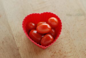 this is a picture of natural grape tomatoes. Read more at beneficial-bento.com