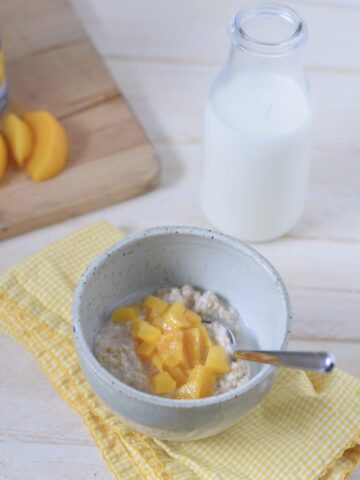 This is a picture of peach instant oatmeal. Recipe at beneficial-bento.com