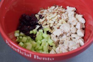 this is a picture of step 2 of how to make Chicken Salad with Cranberries and Poppy Seeds. Recipe at beneficial-bneto.com