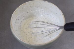 this is a picture of step 1 of how to make Chicken Salad with Cranberries and Poppy Seeds. Recipe at beneficial-bneto.com
