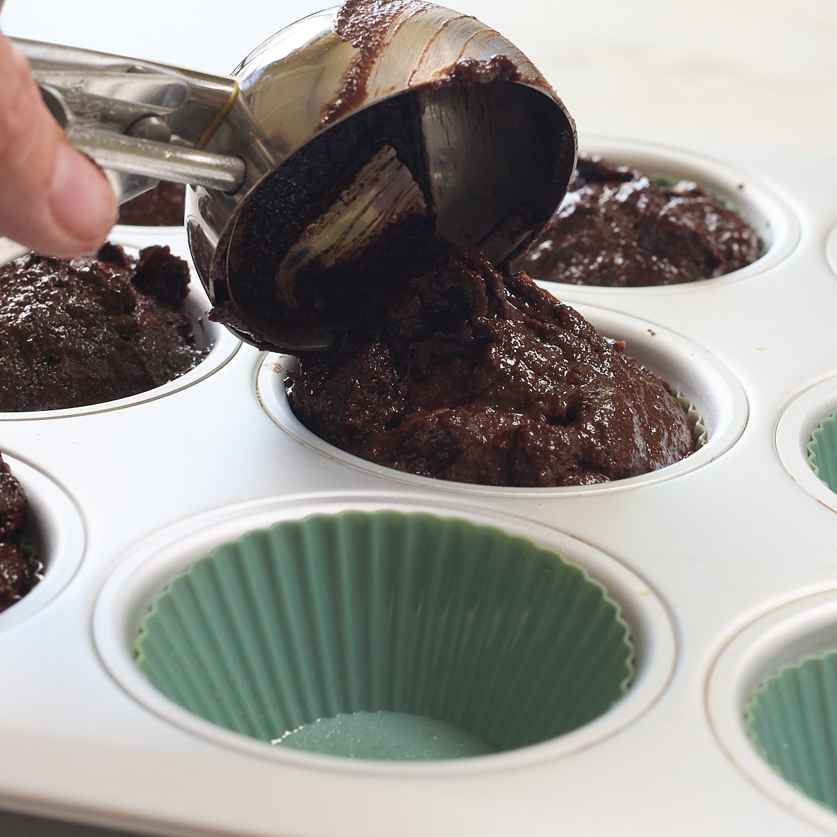 step 7. scoop muffin batter