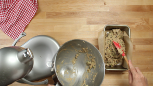 Step 9. Scoop batter into a loaf pan.