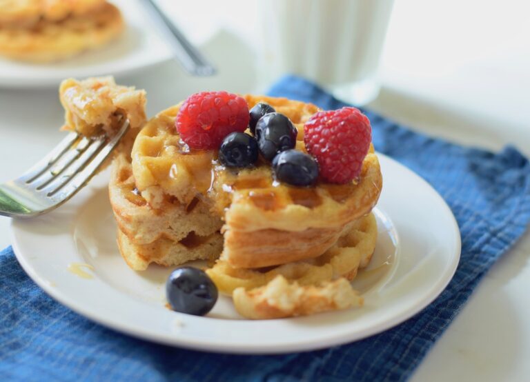 waffles with berries and syrup