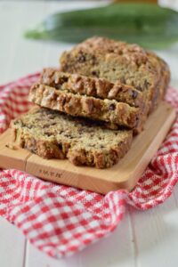 zucchini bread sliced on cutting board