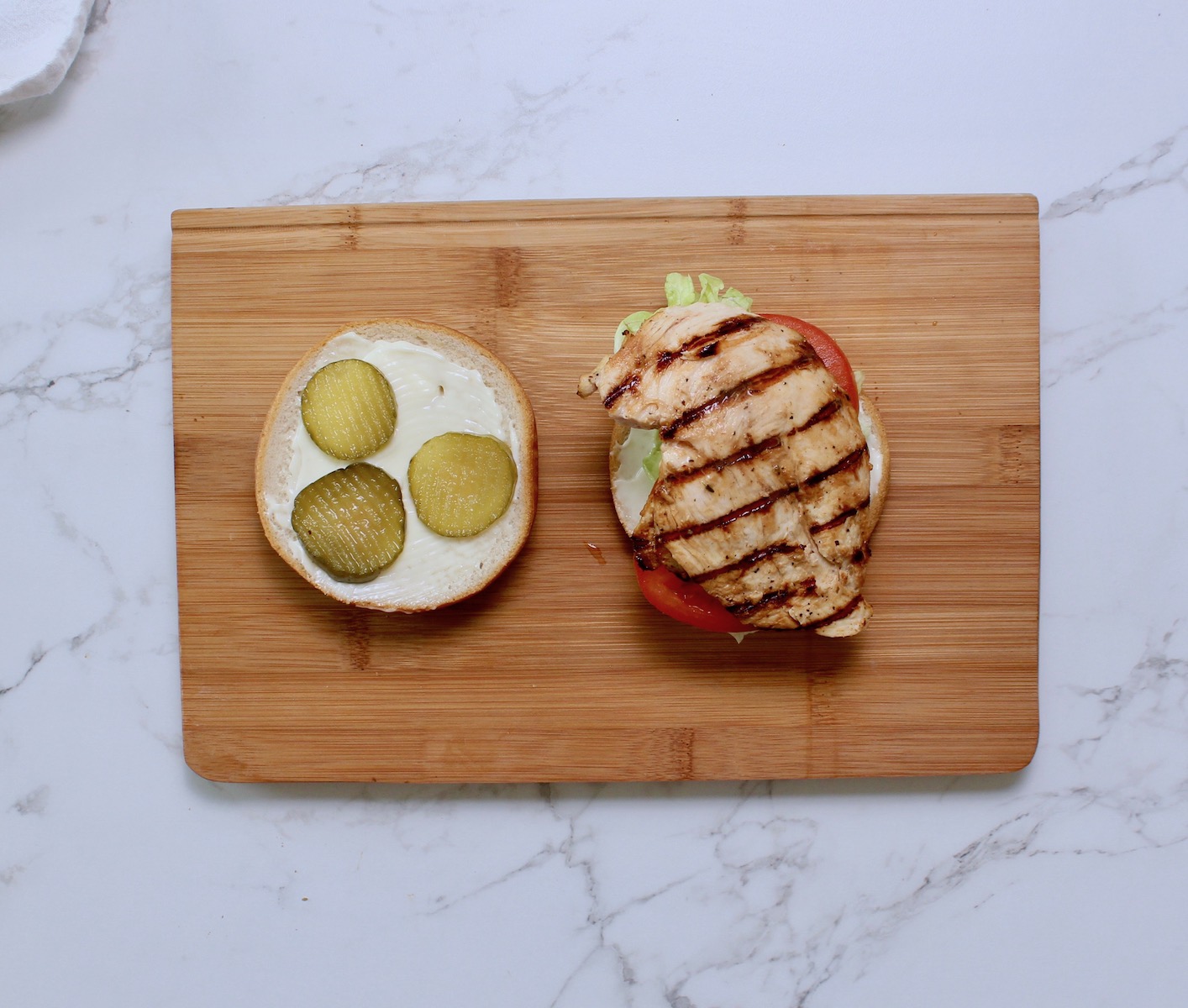 assembling grilled chicken sandwich