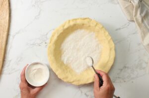 step 6. add crust dust