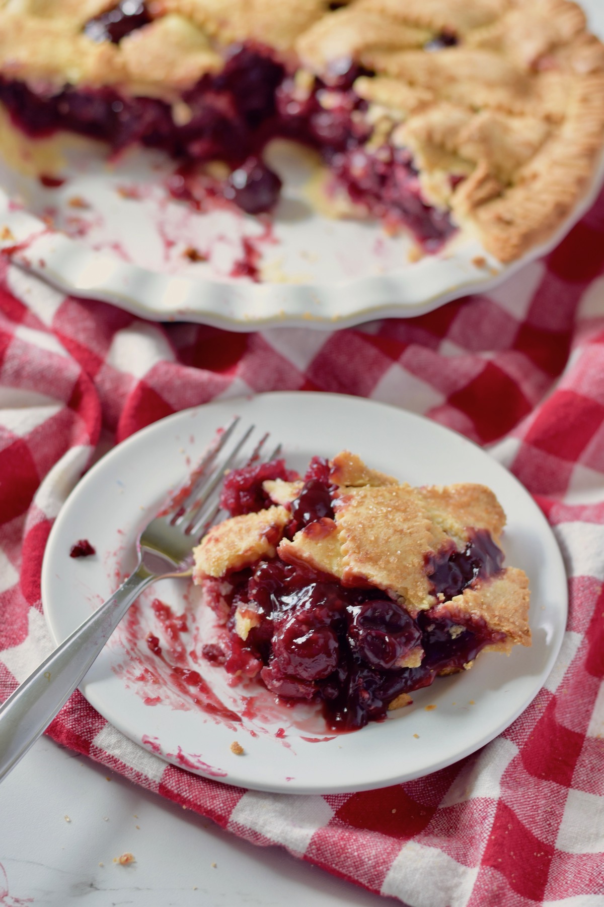 GF cherry pie slice with fork