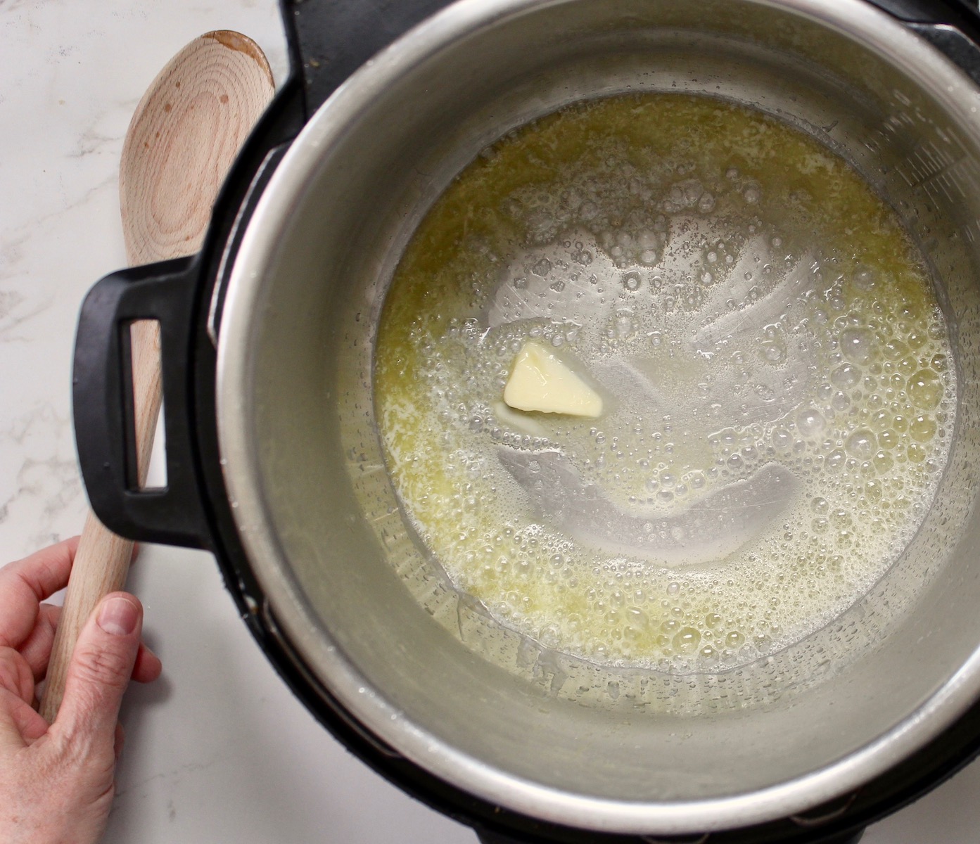 step 1. melt butter in Instant Pot.