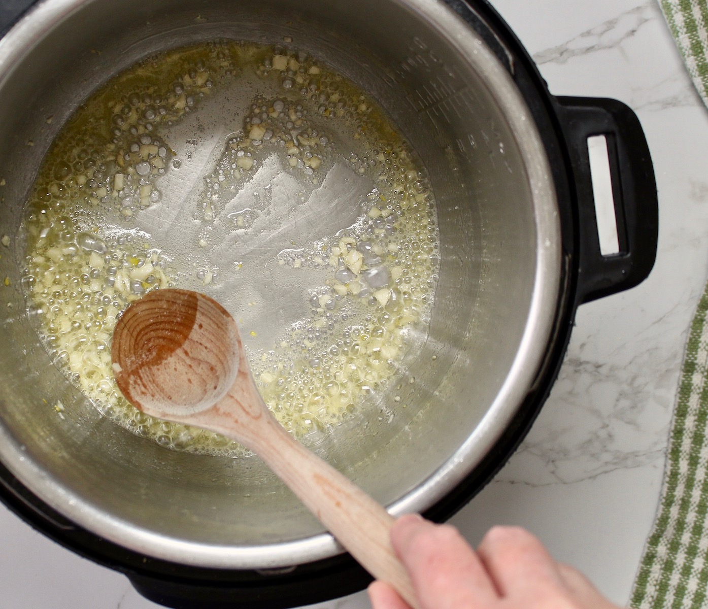 step 2. add garlic and rice