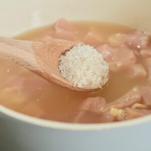 step 3 add rice and chicken to pot