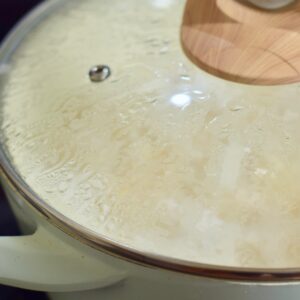step 4. reduce heat, add lid