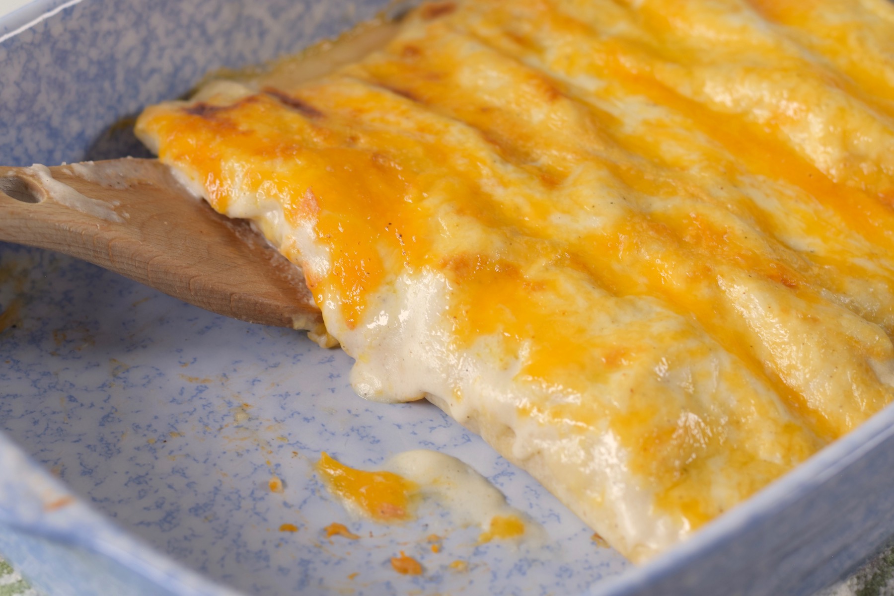 gluten free chicken enchiladas in pan