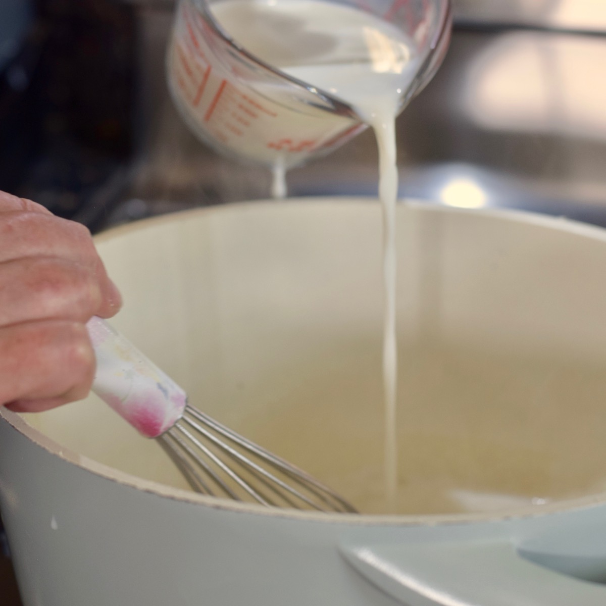step 4. whisk in milk
