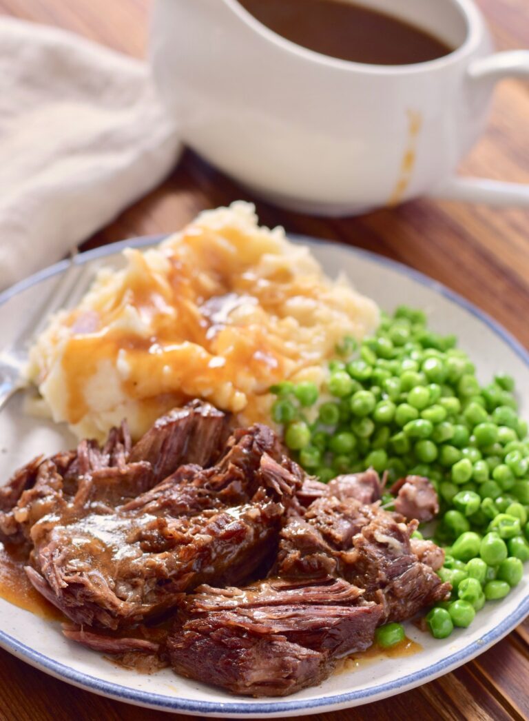 pot roast on plate, gravy