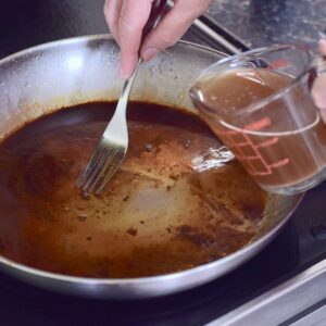 step 5. pour broth into pan