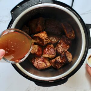 step 6. pour broth from pan into instant pot