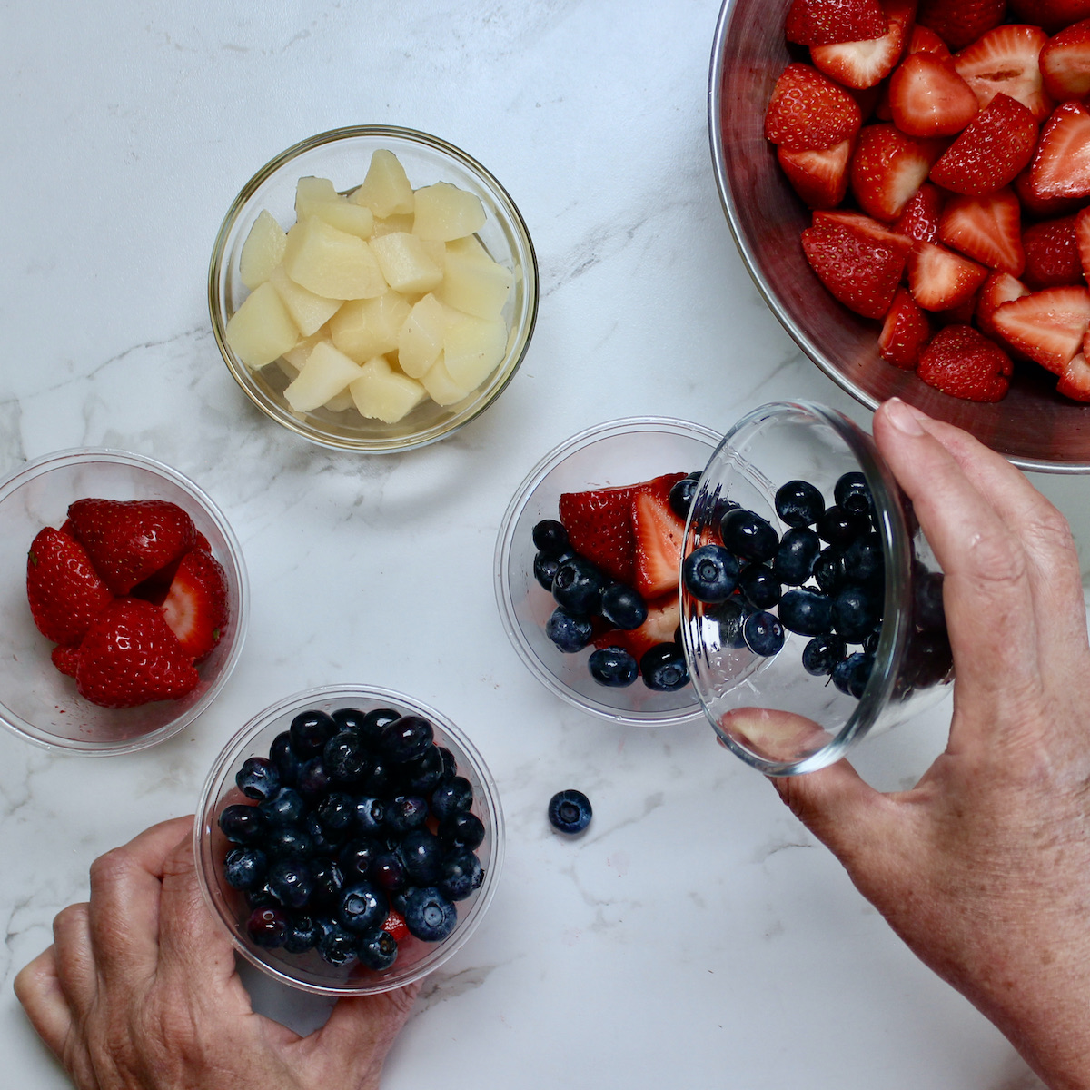 step 2. arrange fruit in clear cups