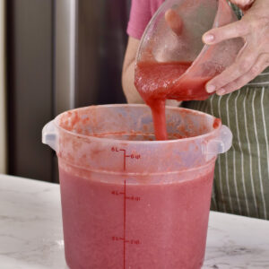 add sauce to large container