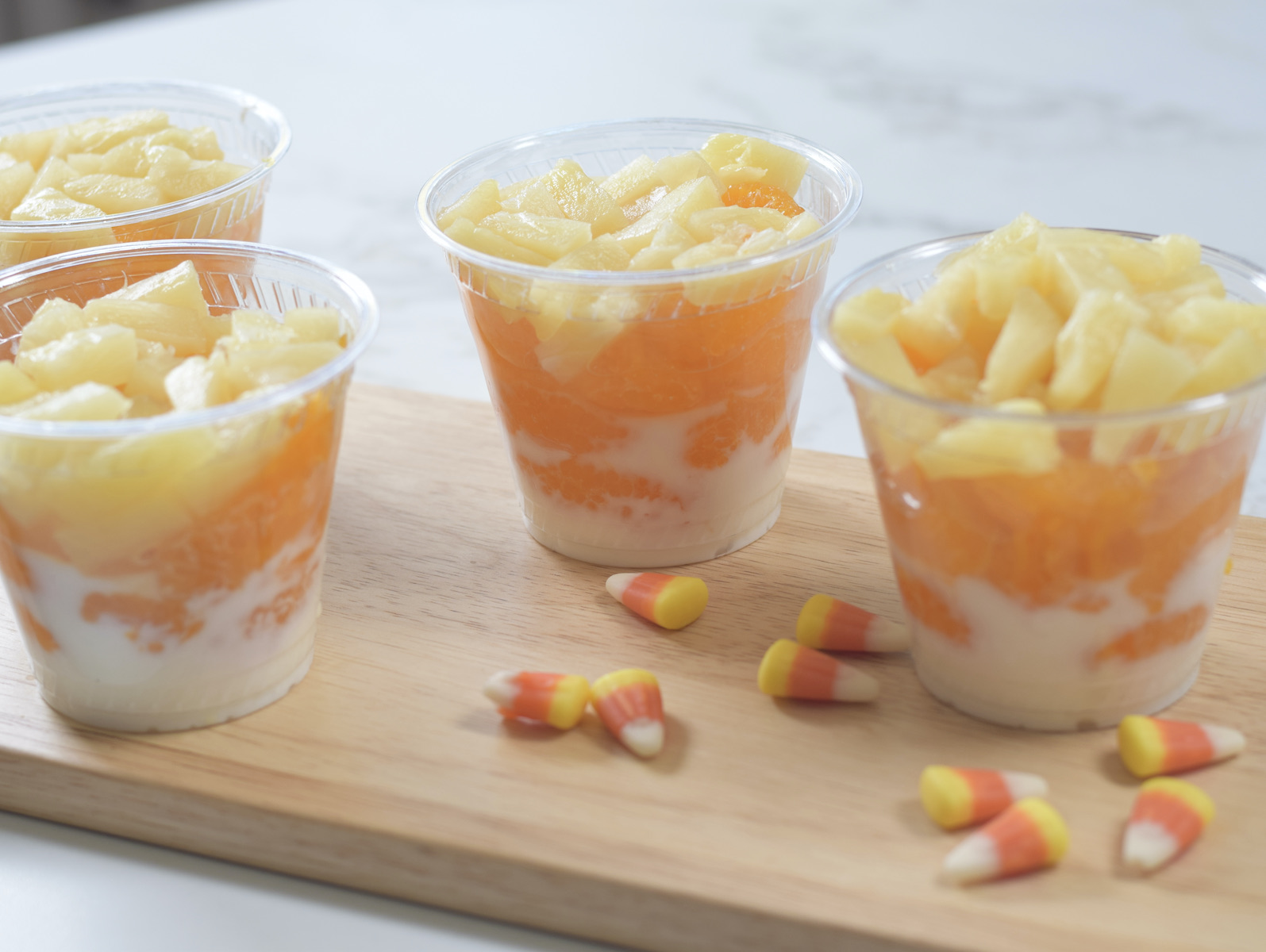 candy corn cups on tray