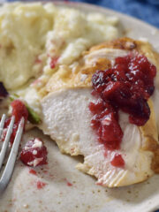 cranberry sauce on chicken, bite