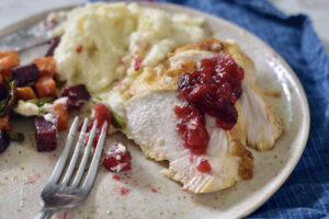 cranberry sauce on chicken, bite