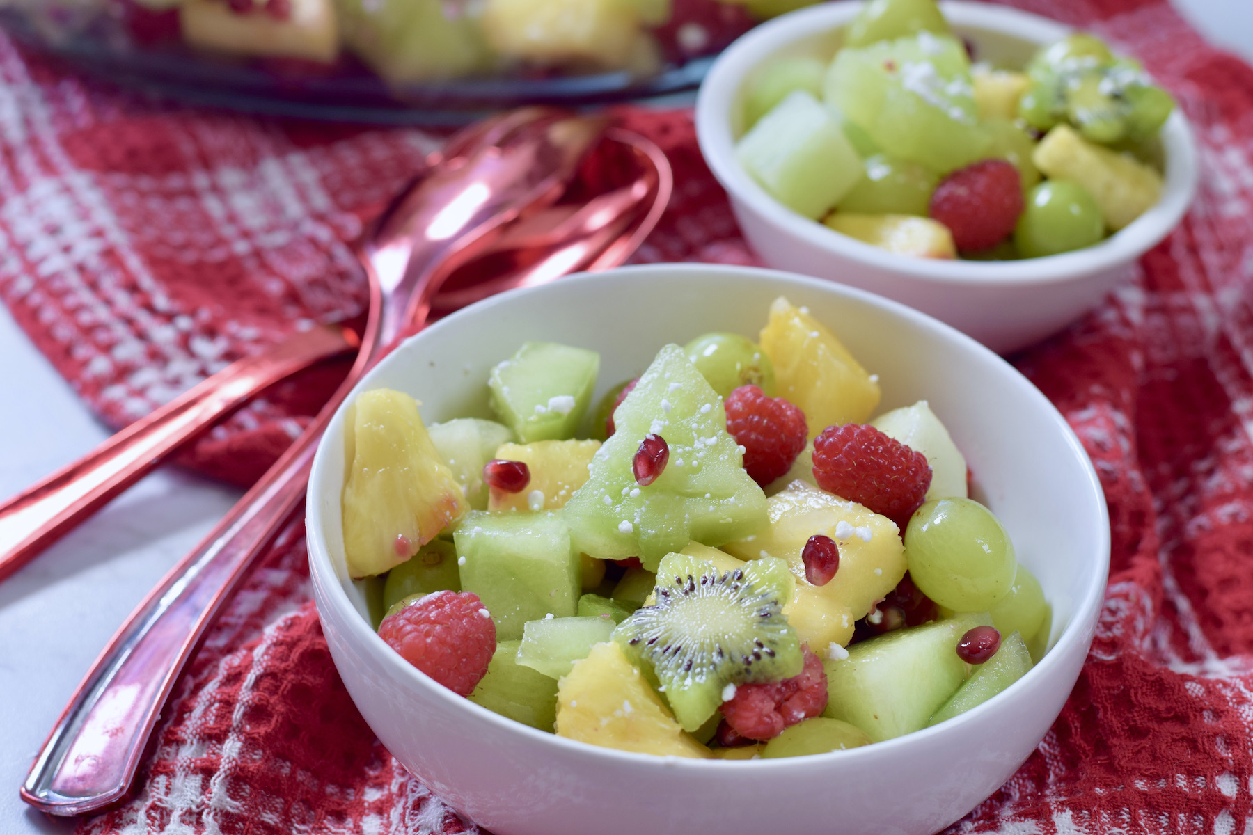 Christmas fruit salad, red spoons