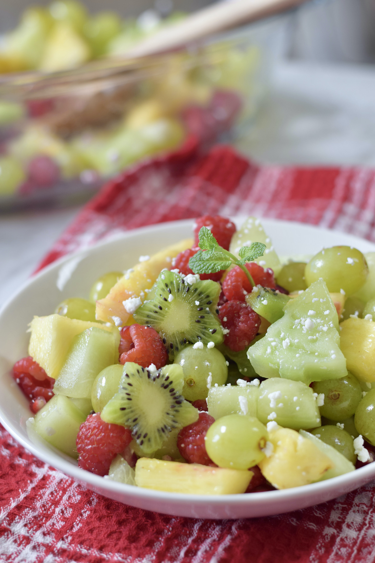 red green fruit salad, mint
