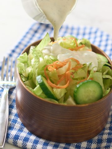 ranch dressing pour on salad