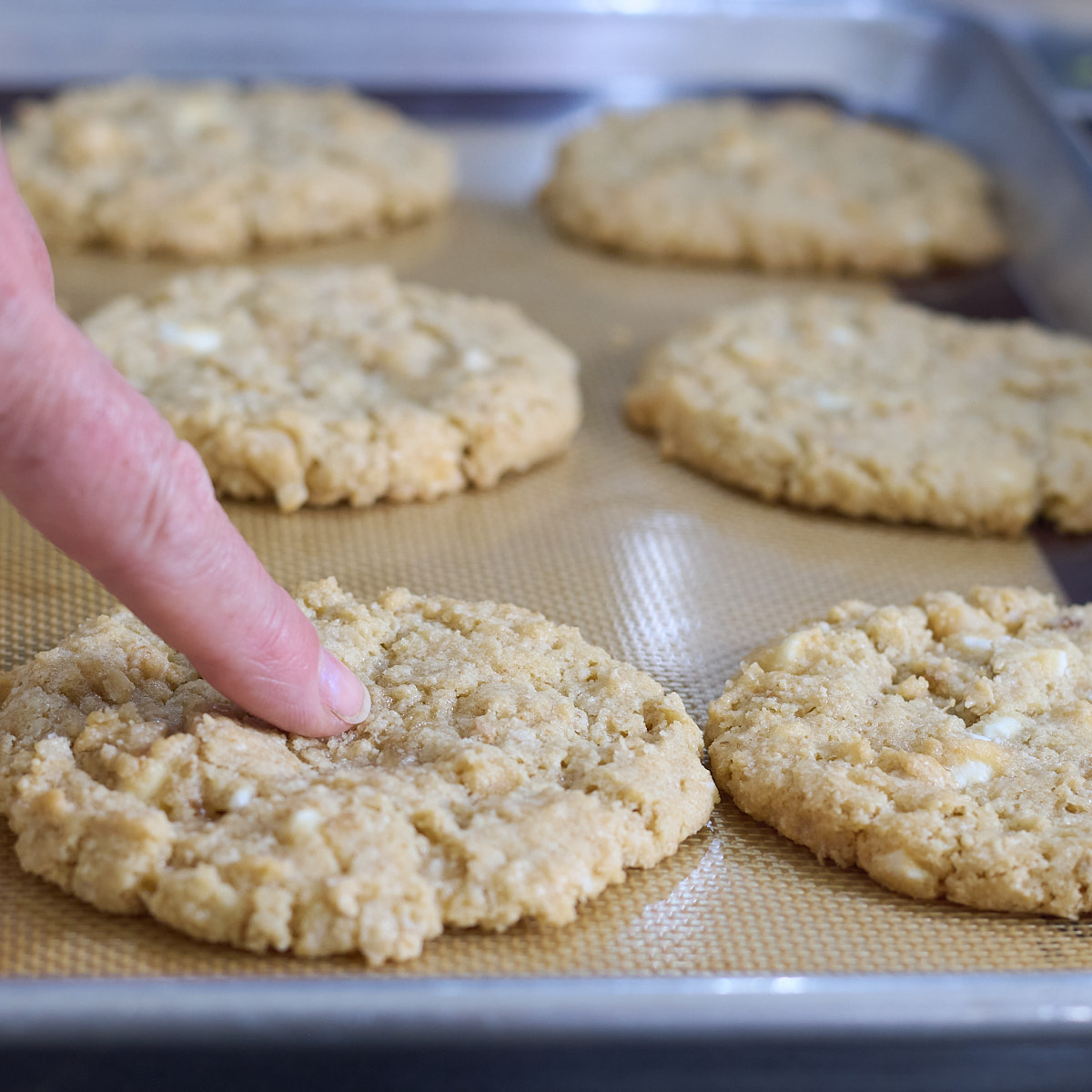 step 7. Touch center of cookie. If it's wet it's not ready yet, if it's dry and set, it's done.