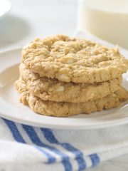 3 cookies on plate with striped towel
