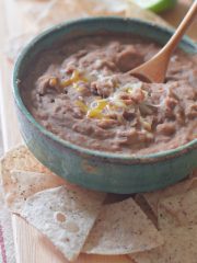 refried beans in bowl, vertical