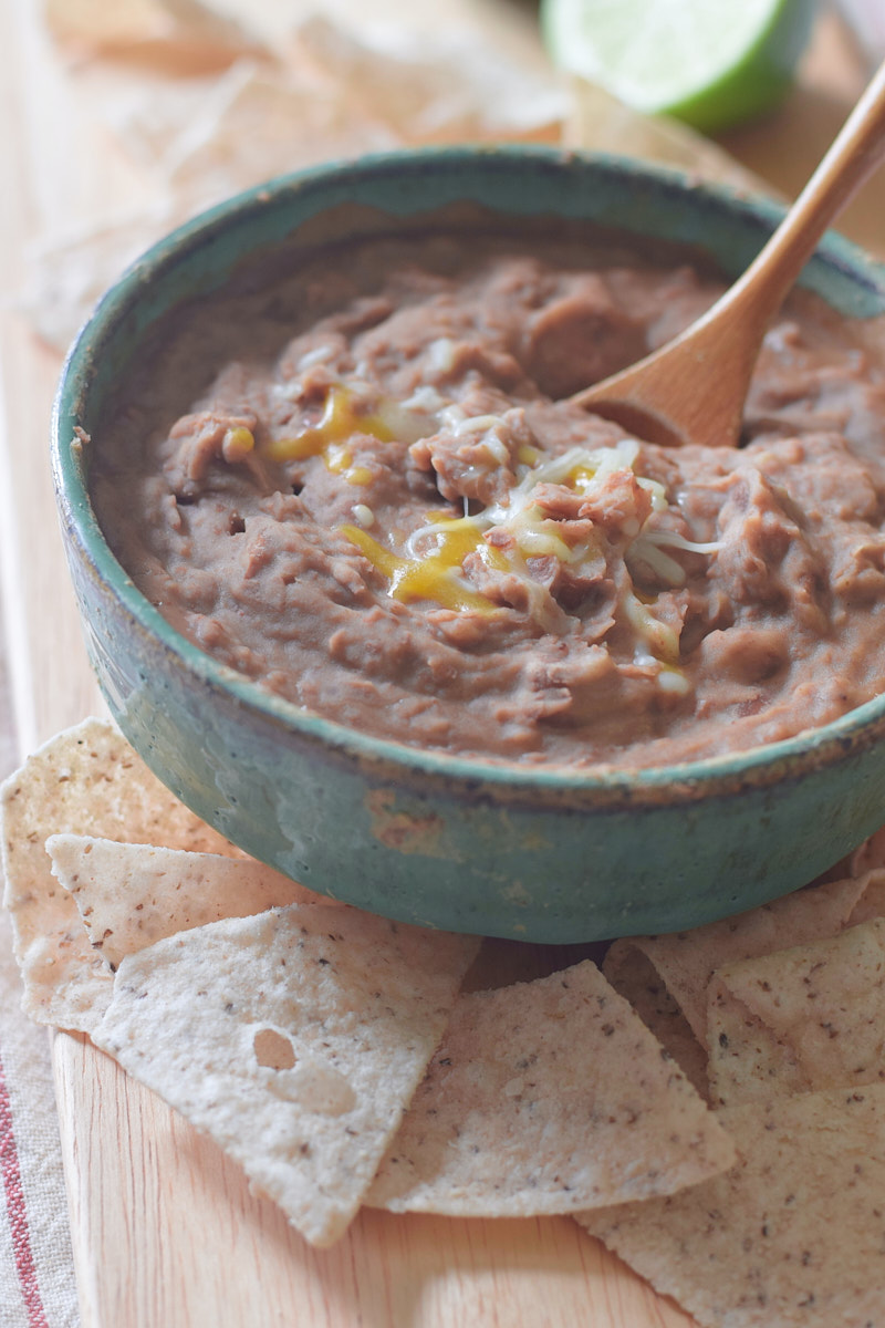 refried beans in bowl, vertical 