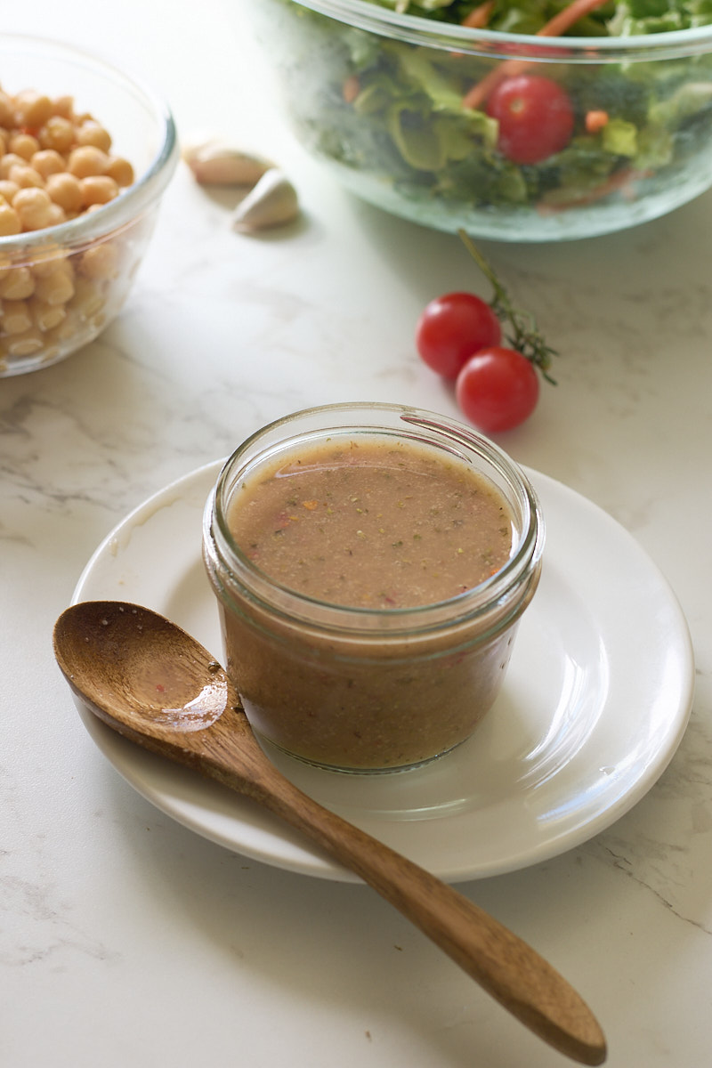 dressing in jar with spoon